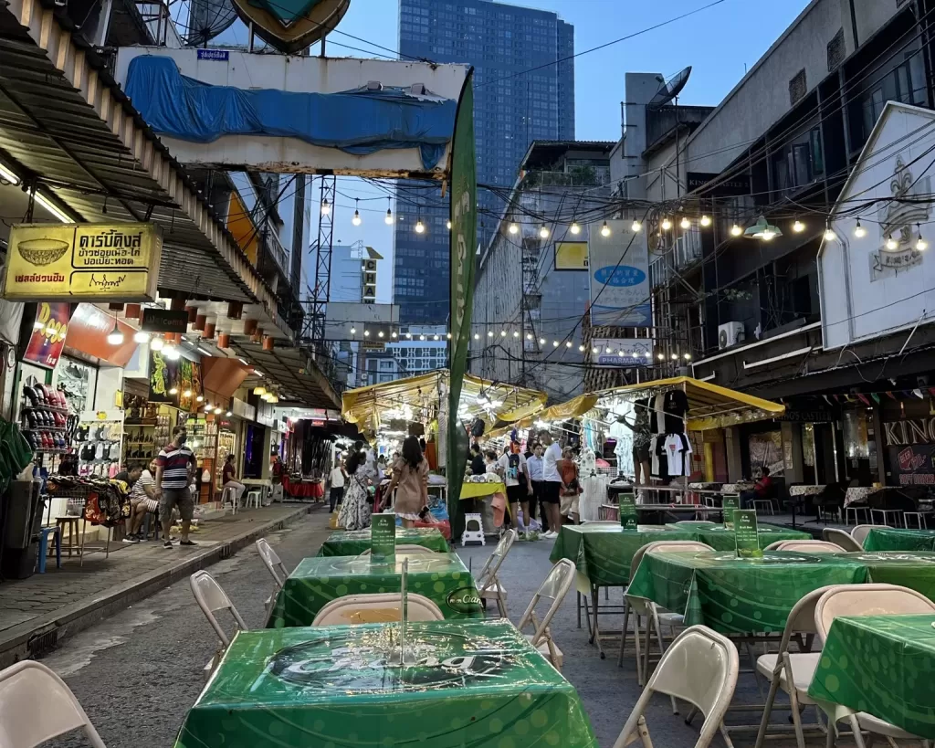 Empty seats at an outdoor restaurant in Pat Pong Night Market, Silom, Bangkok.