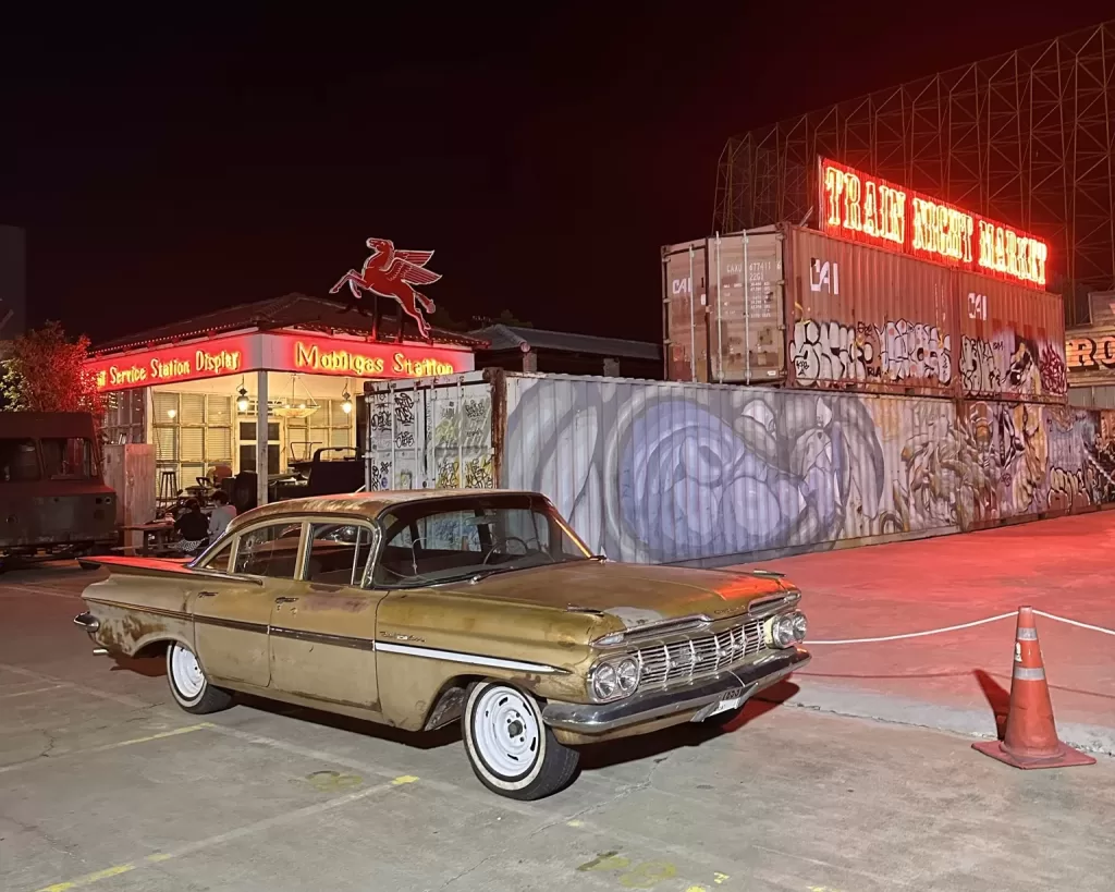 Classic cars on display at Srinagarindra train night market in Bangkok.